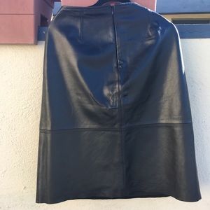 Black leather knee length skirt